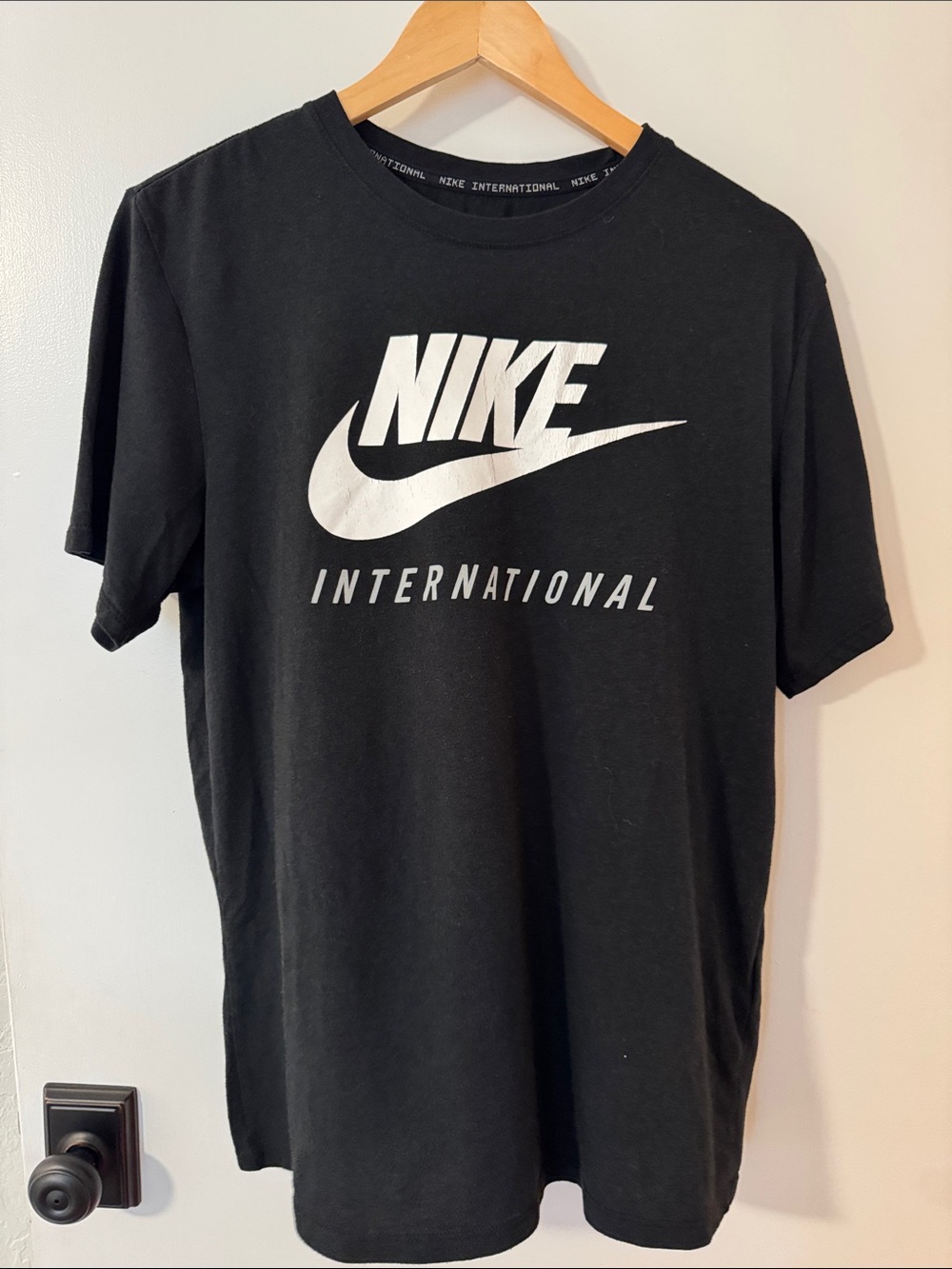 Rare- Vintage “Nike International” Black Short Sleeve Tee 3M reflective sz Large